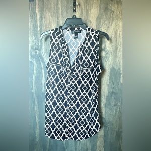 I•N•C International Concepts, Pull Over Black Top with a White Pattern. Size M.